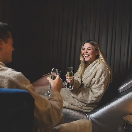 Retallack Resort & Spa Padstow Exterior photo A couple relaxing at the spa