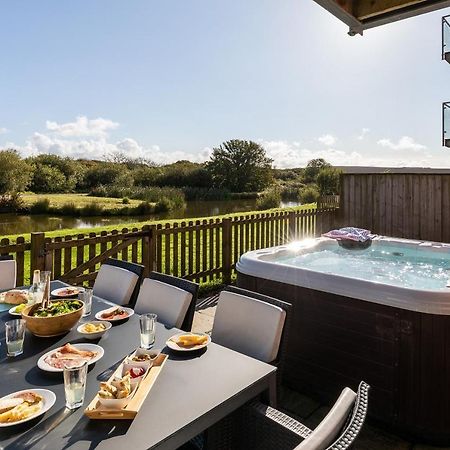 Retallack Resort & Spa Padstow Exterior photo A hot tub at a UK holiday park