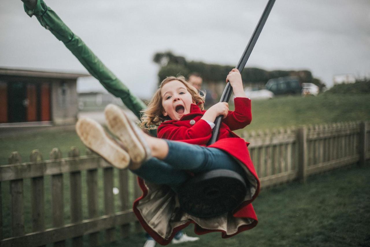 Retallack Resort & Spa Padstow Exterior photo A child on a swing